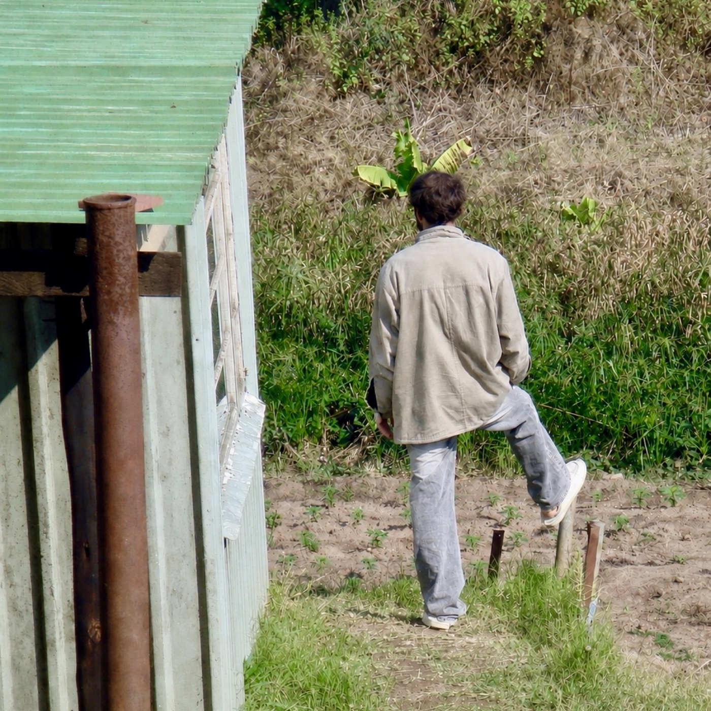 Ryan walking beside a building in South Africa in 2003